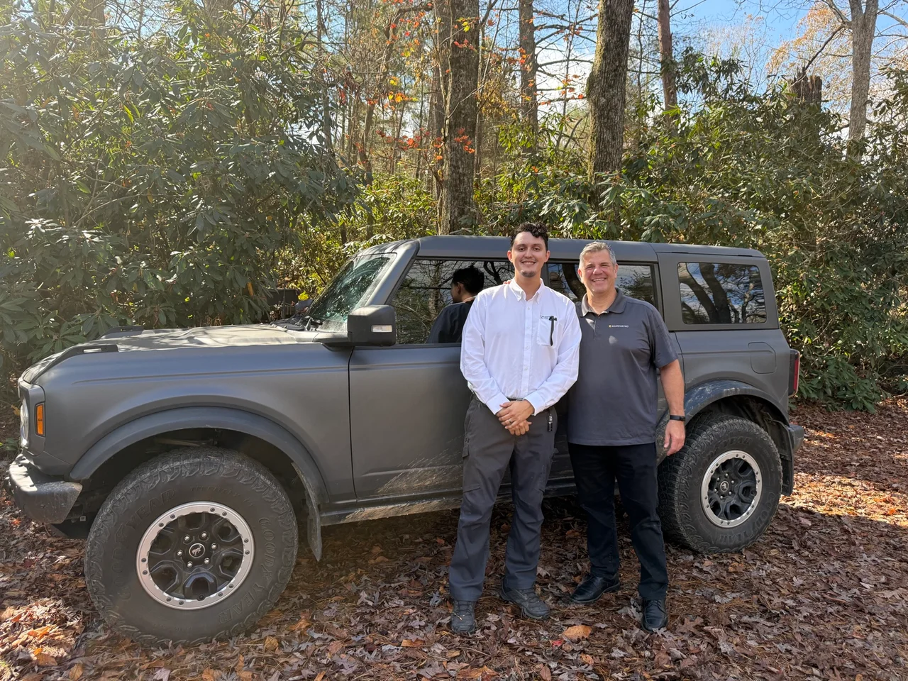 Julian Badillo, on the left, and Pablo beside Julian’s work vehicle in North Carolina