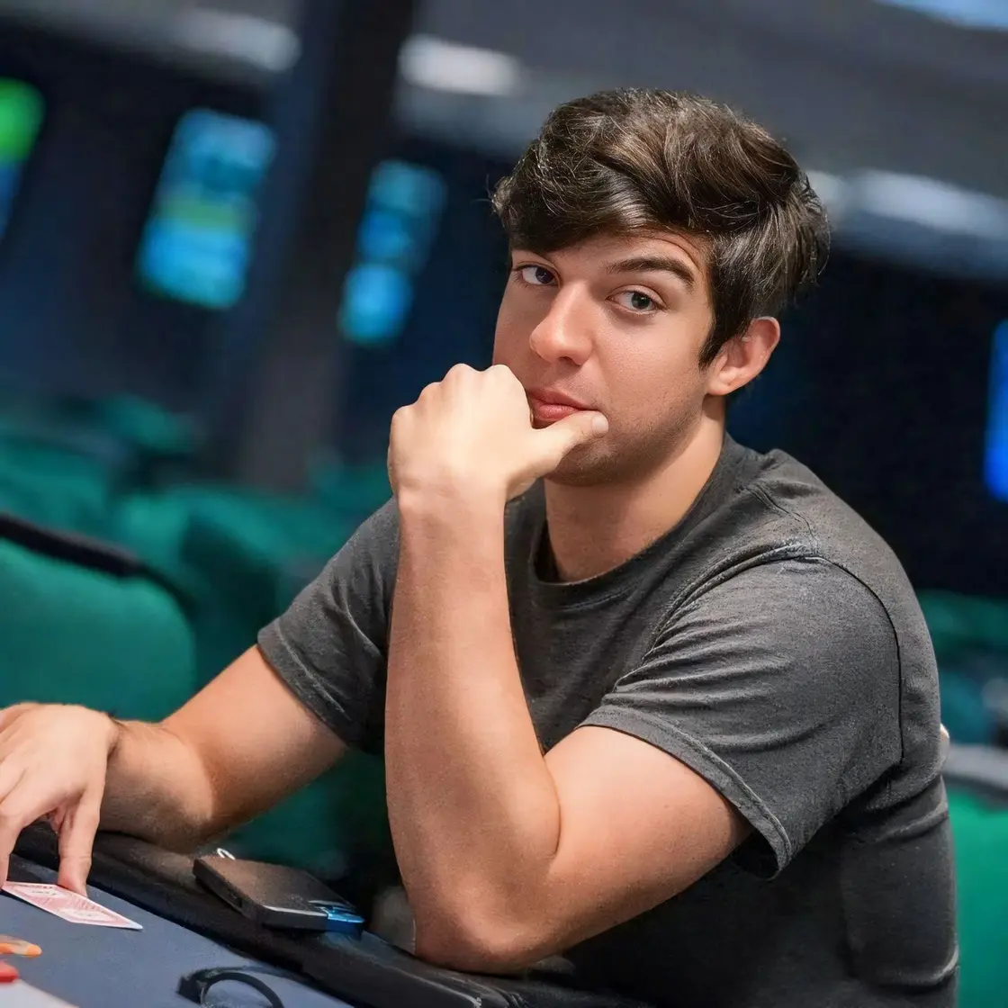Ryan Estrada seated at a poker table